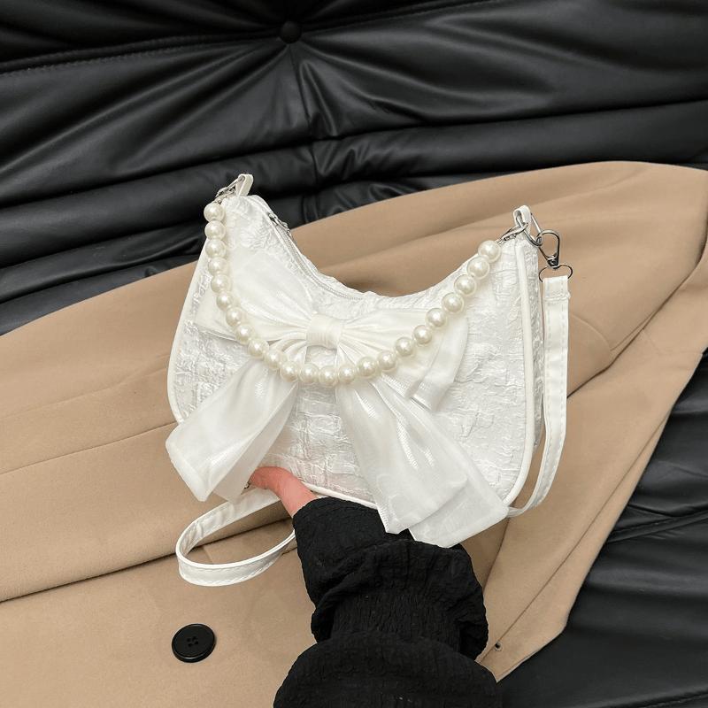 Korean style fashionable crossbody bag for women, sweet and elegant, with a bow and pearl chain, perfect for elegant commuting and everyday use. белый