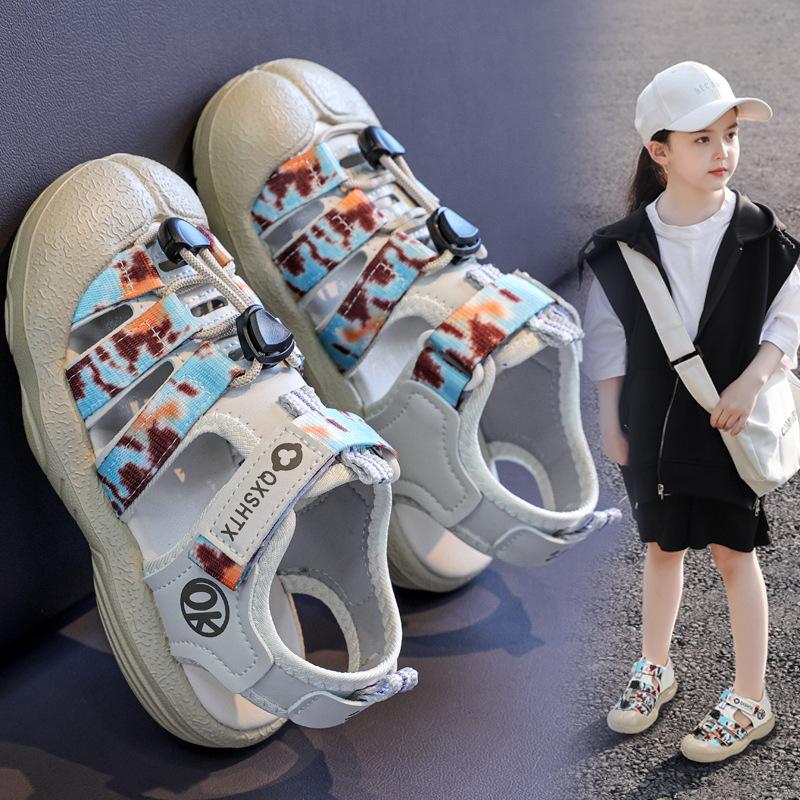 Children's sandals 2025 summer new soft-soled boys' beach shoes girls' hollow bag head sandals medium and older children's shoes