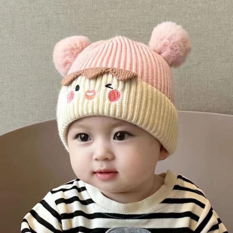 Baby autumn and winter cute cartoon warm hairball wool hat boys and girls baby ear protection hat children pullover knitted hat