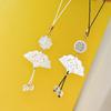 Four-Leaf Clover White Shell Fan Charm: Ancient-Style Phone Chain, Bag Pendant & Lanyard for Shoes, Clothing, and Phone Cases