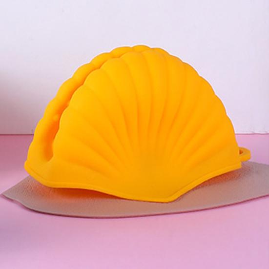 1 pár dlouhotrvajících rukavic proti opaření Konstrukce tvaru skořepiny Odolné držáky hrnců s horkou rukojetí