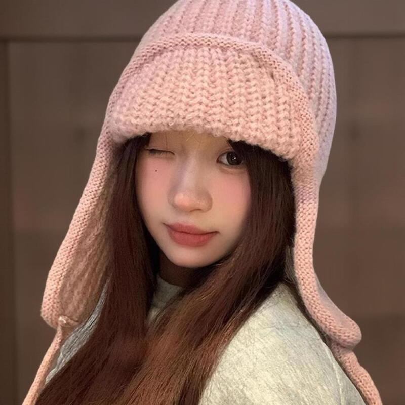 Lovely twisted knit hat with earmuffs for women
