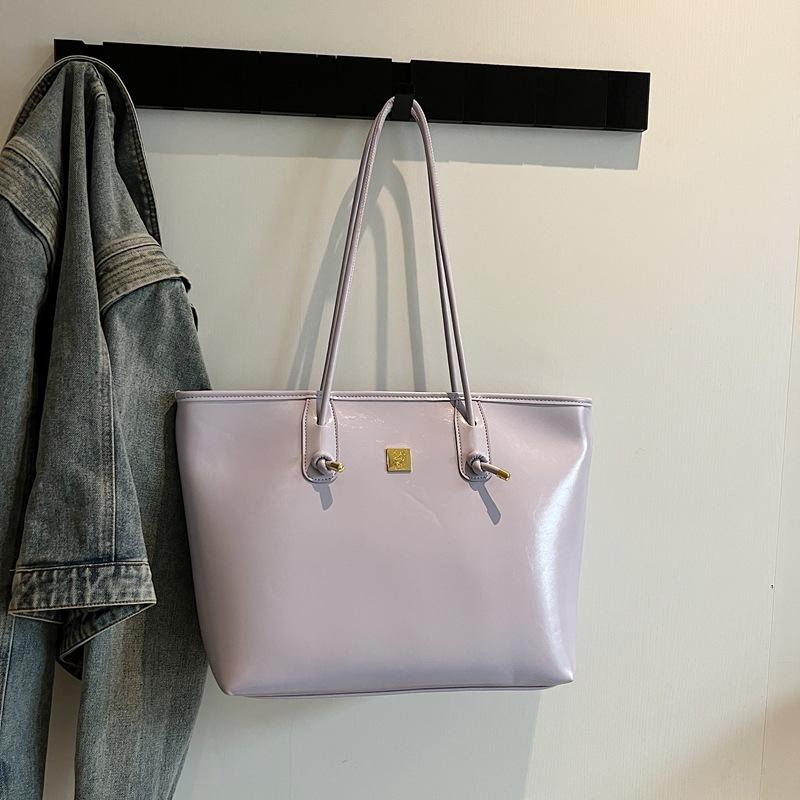 

Korean version commuter tote bag large capacity women s armpit bag 2025 new solid color simple tote bag versatile shoulder bag фіолетовий