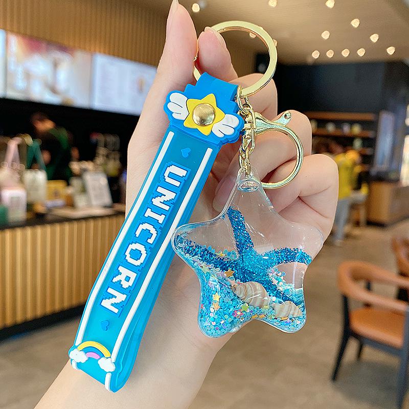 

Брелок-масло с зыбучим песком в виде морской звезды: Изысканный кулон для женских сумок, студентов и детей - Милое плавающее украшение в виде школьного ранца Individual Packaging