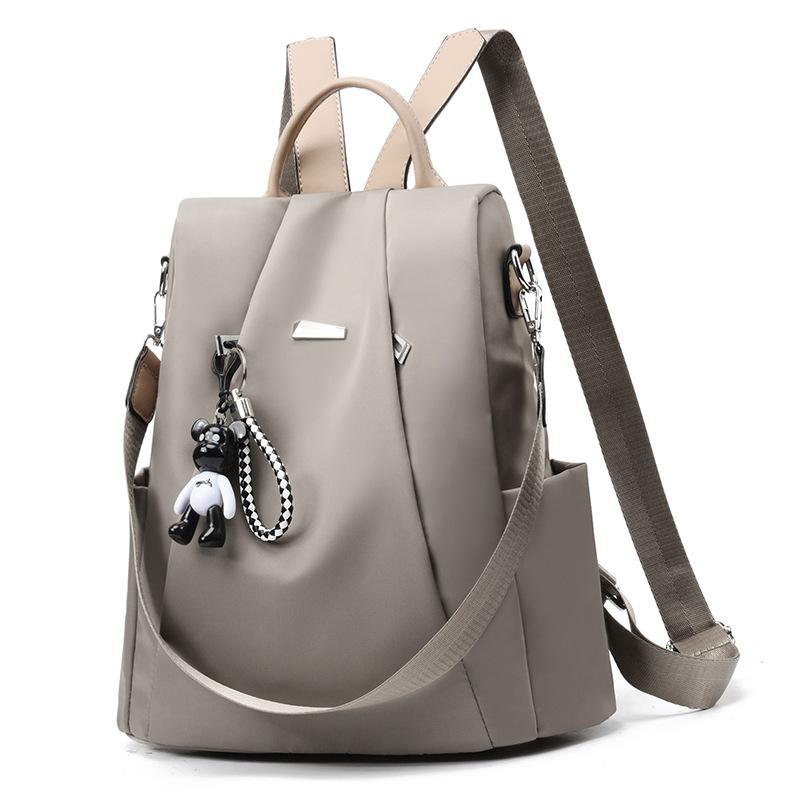 

Трендовая брендовая женская сумка из ткани Оксфорд 2025 новая женская рюкзак модная личность портативный наплечный рюкзак 19 inch