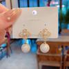 Korean-Style Pearl Four-Leaf Clover Clip-On Earrings: Elegant, Versatile, No Piercing Required, Delicate Fashion Jewelry.