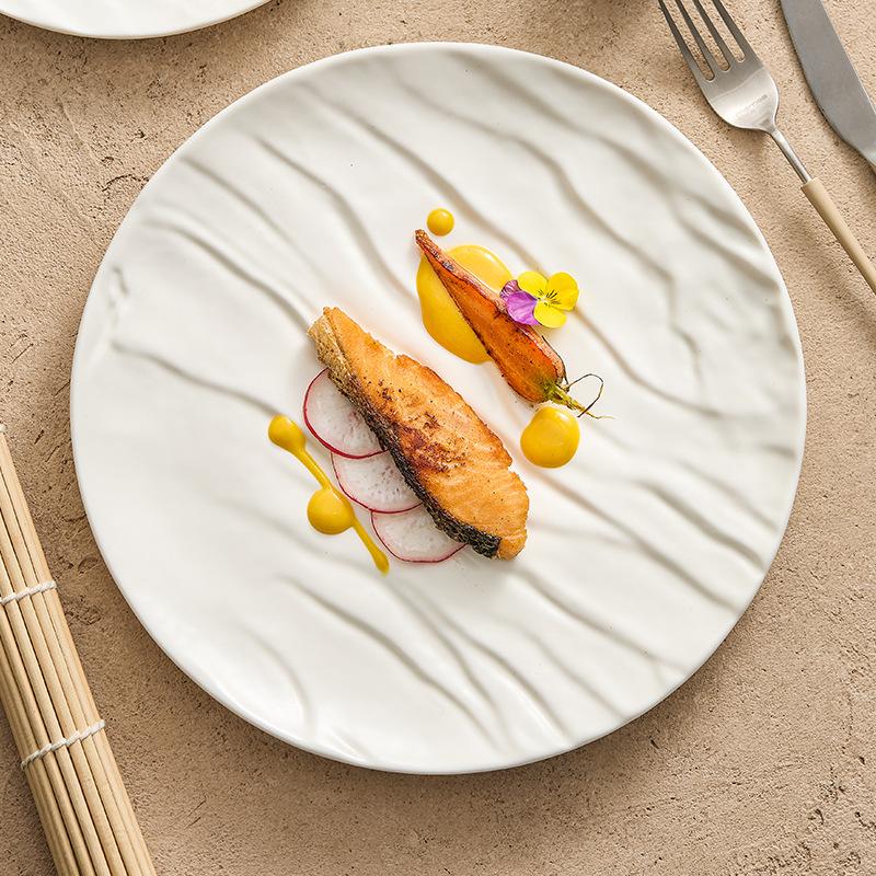 Matte corrugated ceramic western-style dishes steak dishes high-grade light luxury artistic conception dishes round plates.