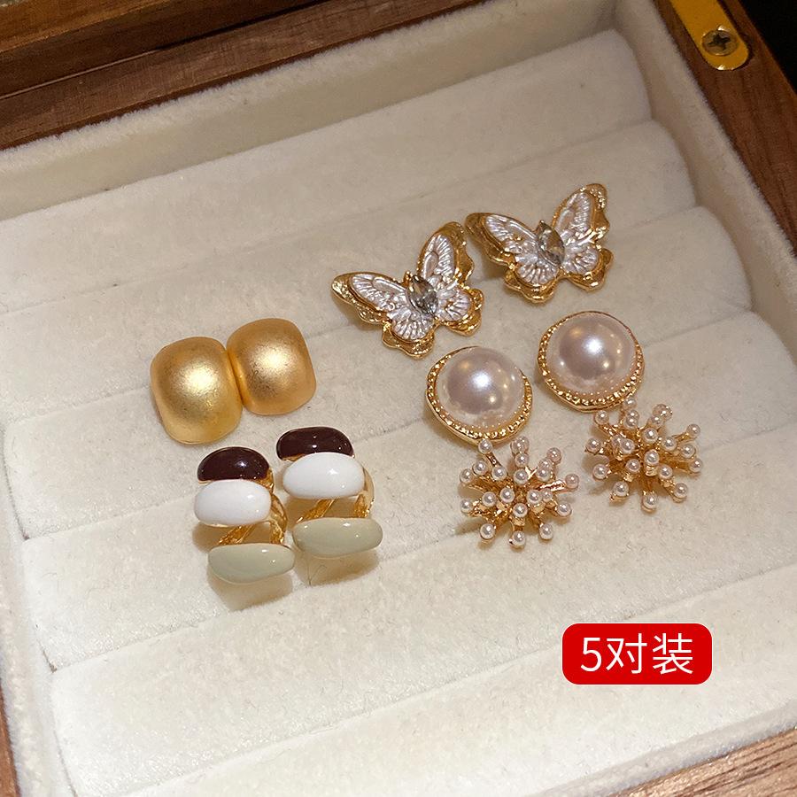 

Silver needle oil drop pearl butterfly stud earrings ten-piece set retro personality temperament earrings light luxury high-end earrings