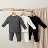Children's Solid Color Warm Two-Piece Set for Autumn/Winter - Base Layer Shirt and Home Wear for Boys and Girls