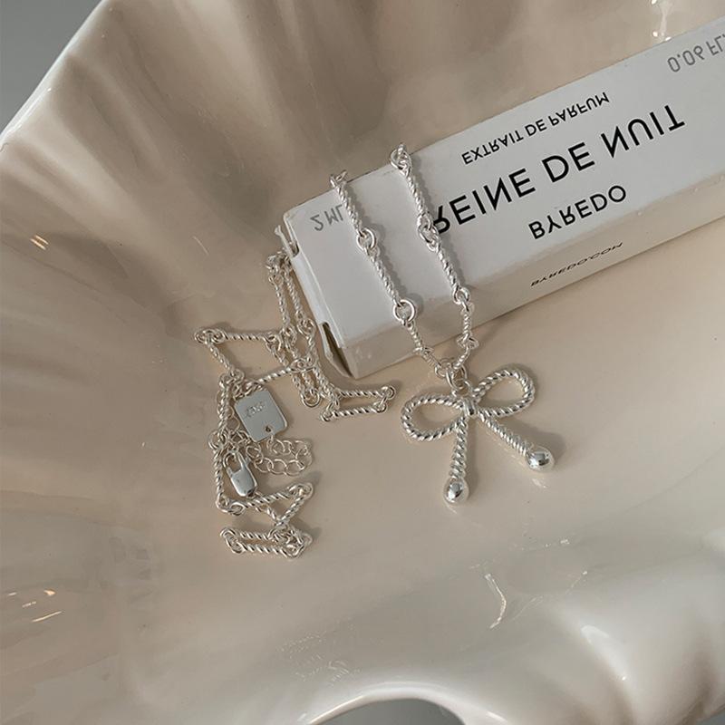 Dulce și răcoros colier cu fundă răsucită pentru femeie, design de nișă, senzație de lumină, lux, personalitate elegantă, modă, lanț pentru gât, lanț pentru claviculă