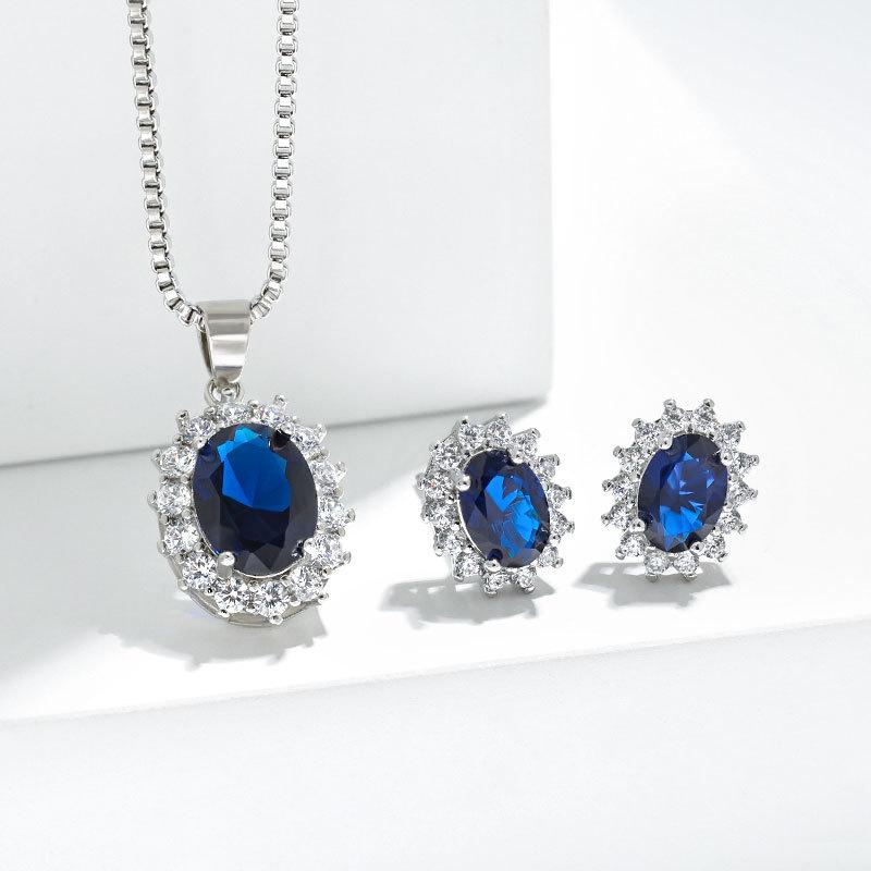 Zodiac Stone Gemstone Stud Earrings: Exaggerated Royal Blue Sapphire Sunflower Design In European and American Style.
