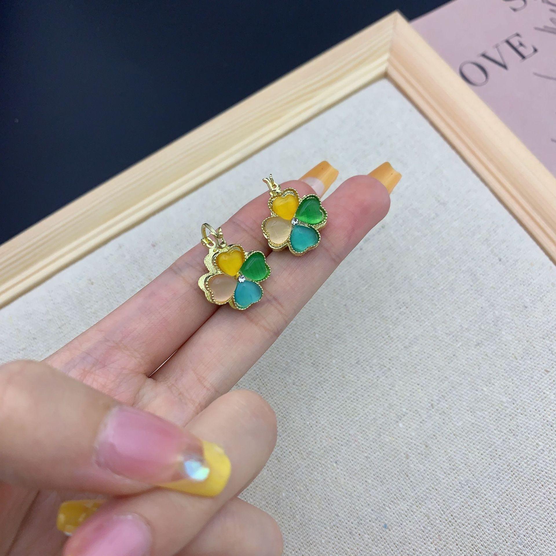 

Высококачественные милые маленькие свежие серьги-цветы «четыре листа» с пряжкой, двухсторонние женские серьги с кошачьим глазом