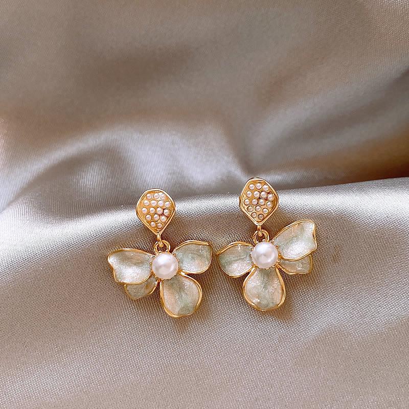 

Серьги-гвоздики с капающим маслом, с цветком и жемчугом, темпераментные, универсальные, изысканные, нишевые, высококлассные, женские