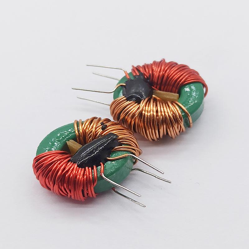 Common Mode Choke Inductor, T12x6x4, 0.35 Wire, Red Bobbin, Split Winding 20mH 2A, with Magnetic Core and Central Partition.