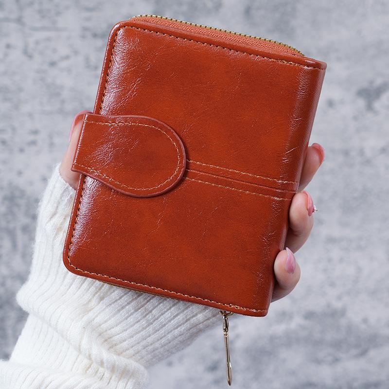 

2023 Retro Women s Wax Leather Coin Purse: Cross-Border Short Wallet with Buckle коричневый
