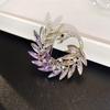 Elegant Rhinestone Animal Brooch: High-End Flower Design for Women's Coats and Accessories