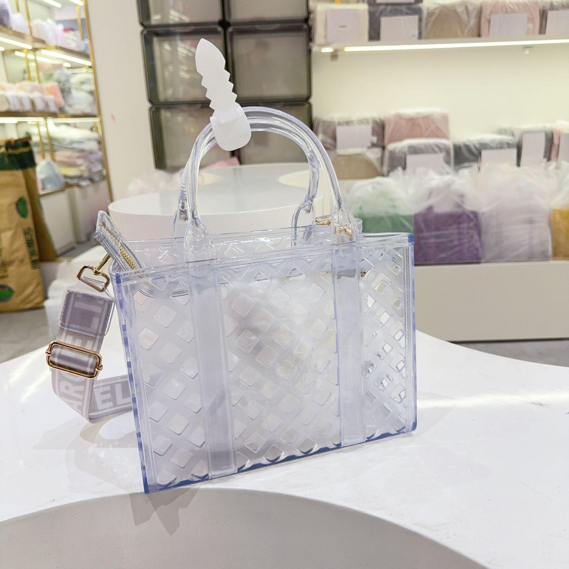 

Нишевый дизайнерский сенс полый пластиковый портативный пакет для овощей модная личность широкий плечевой ремень сумка-мессенджер женская прозрачный