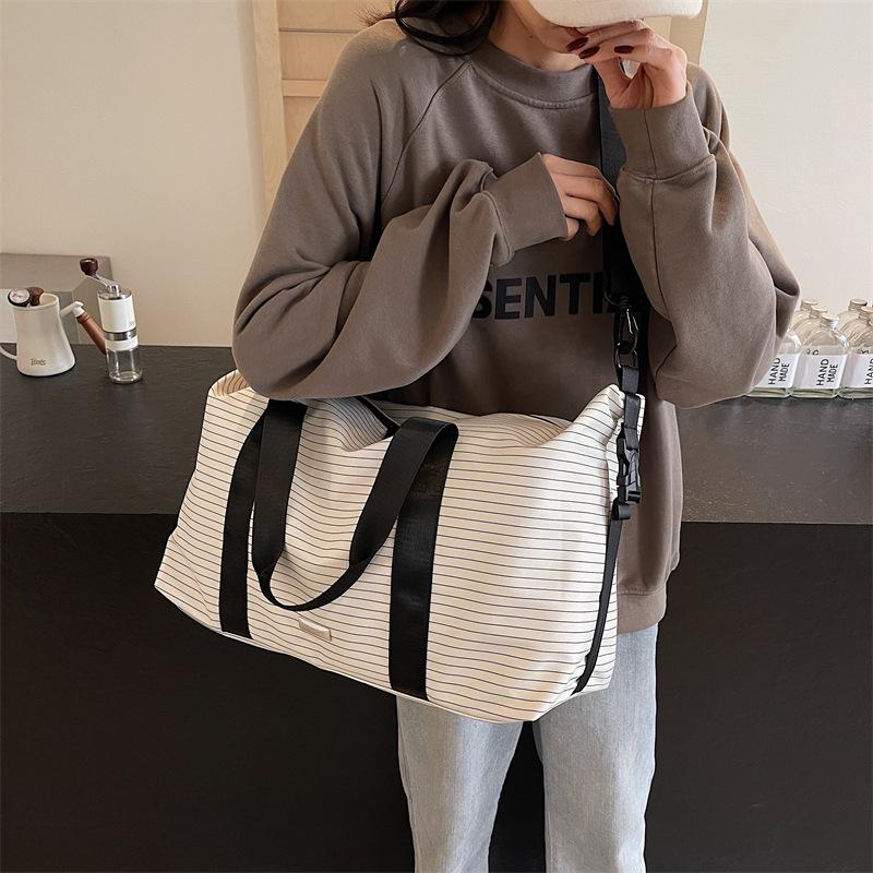 New luggage bag striped waterproof large-capacity swimming men's and women's storage bag lightweight business trip fitness bag