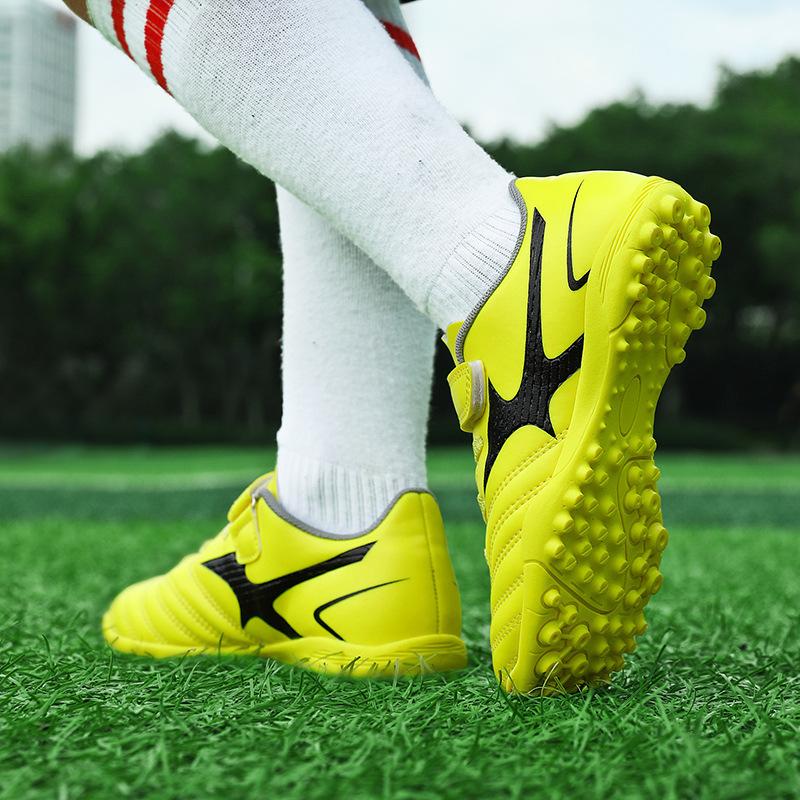 Manufacturer football shoes men's flat-soled adult grass spiked shoes adolescent boys and girls primary school students training TF broken spiked sho