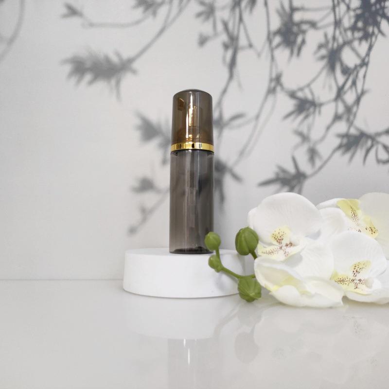Available 60ml Transparent Black Foam Mousse Bottle for Face Wash and Travel-friendly Cosmetic Packaging.