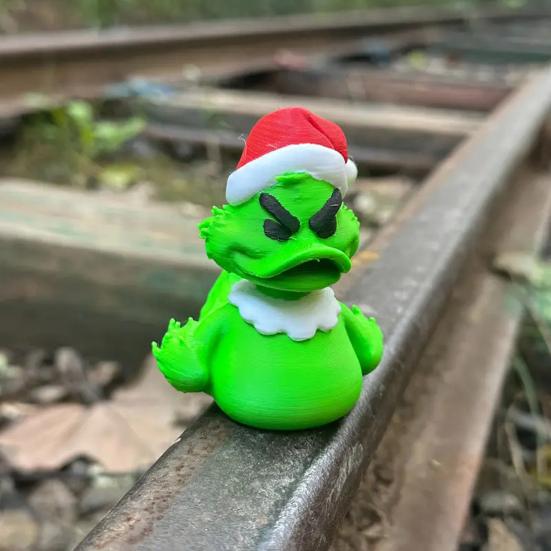 Mini Green Duck Figurine Collectible Christmas Duck Ornament Duck Figure Wearing Xmas Hat for Festival Party Table Shelf Decoration