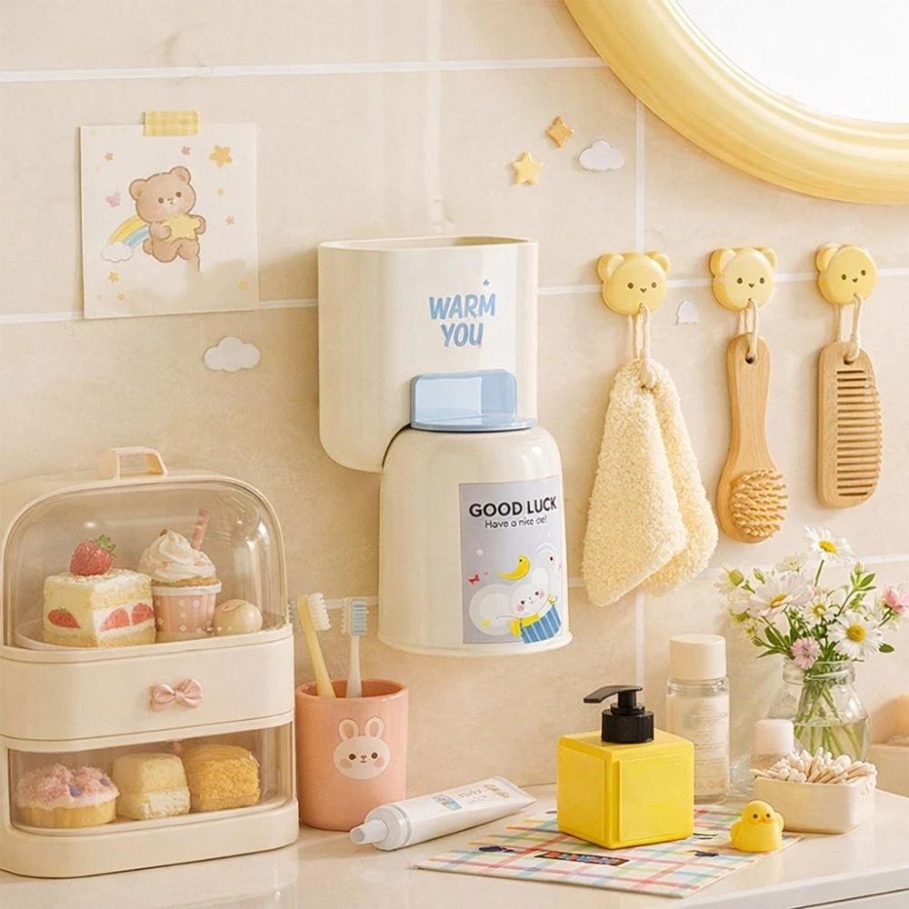 Süßer Wandmontierter Zahnbürstenhalter Stanzfreier Zahnpastaklip Mundspülbecher-Haken Badezimmer