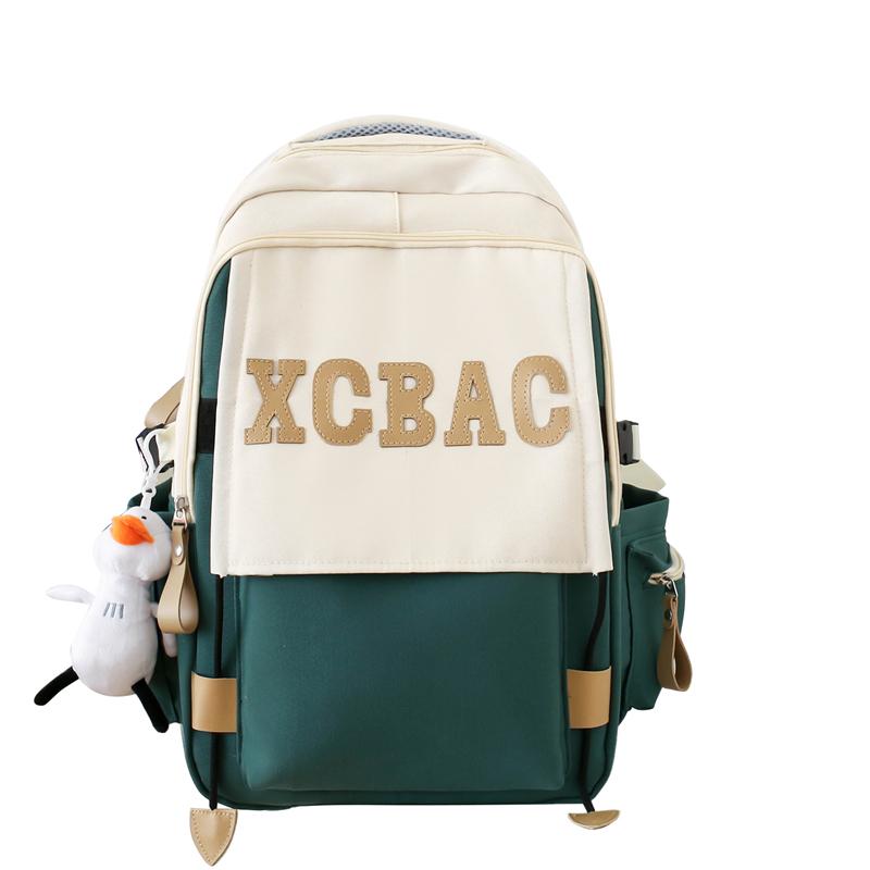 

Студентський шкільний рюкзак великої місткості. Чоловічий легкий рюкзак для подорожей з комп’ютером. Рюкзак із кольоровими буквами зелений