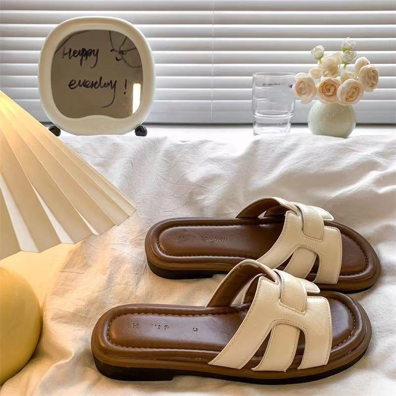 Franska retro cool tofflor med ett ord dam 2025 nya ytterplagg fyrkantig tå vävda muller-skor mjuk sula strandtofflor