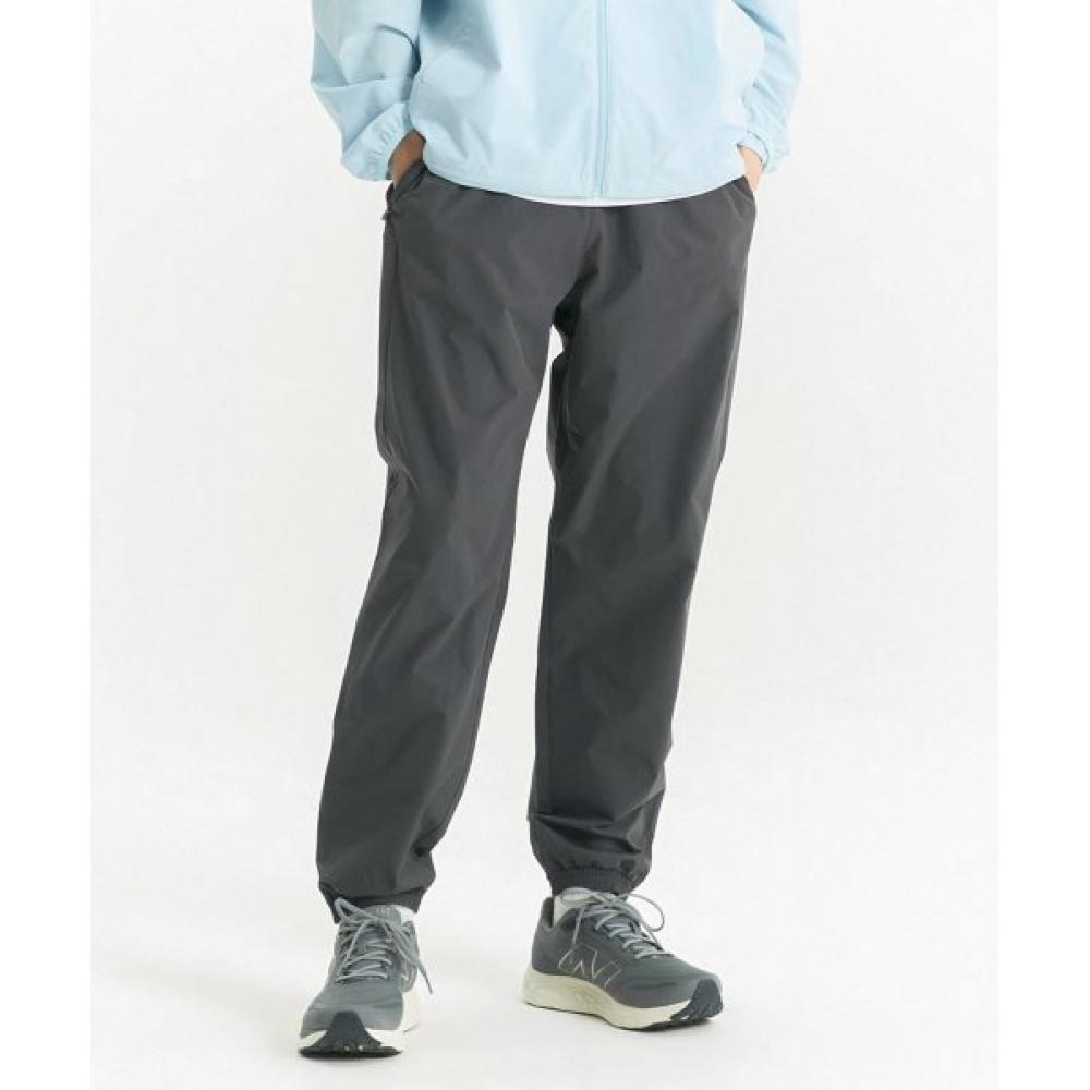 

NEW BALANCE NBNTE12333 Брюки для бега UNI Running Essentials Speed ​​Jogger Темно-серые