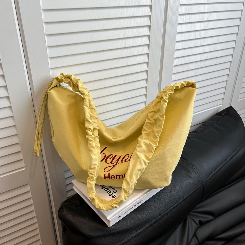 Large-capacity niche design personalized bag women's 2025 fashion commuter dumpling bag Korean simple single shoulder oblique span bag