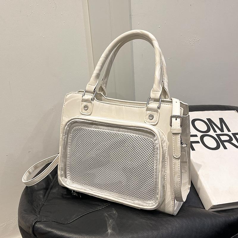 Japanese two-dimensional yuan handbag woman 2025 new girl soft girl shoulder crossbody pain bag portable commuter bag woman