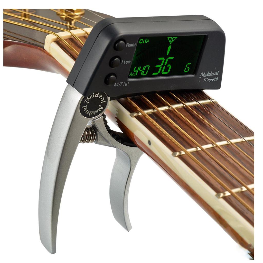 Integrated guitar tuner with capo, clip-on tuner for acoustic and electric guitars, bass tuner, compact and easy-to-use LCD display