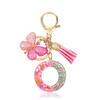 Pink Epoxy Letter Keychain with Sequin Butterfly & Tassel Charm