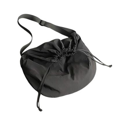 Harujio Drawstring Bag, Unisex Shoulder Bag for Men and Women, Large Capacity, Nylon, Crossbody, Perfect for Sports, Outdoors, and Travel, Stylish,