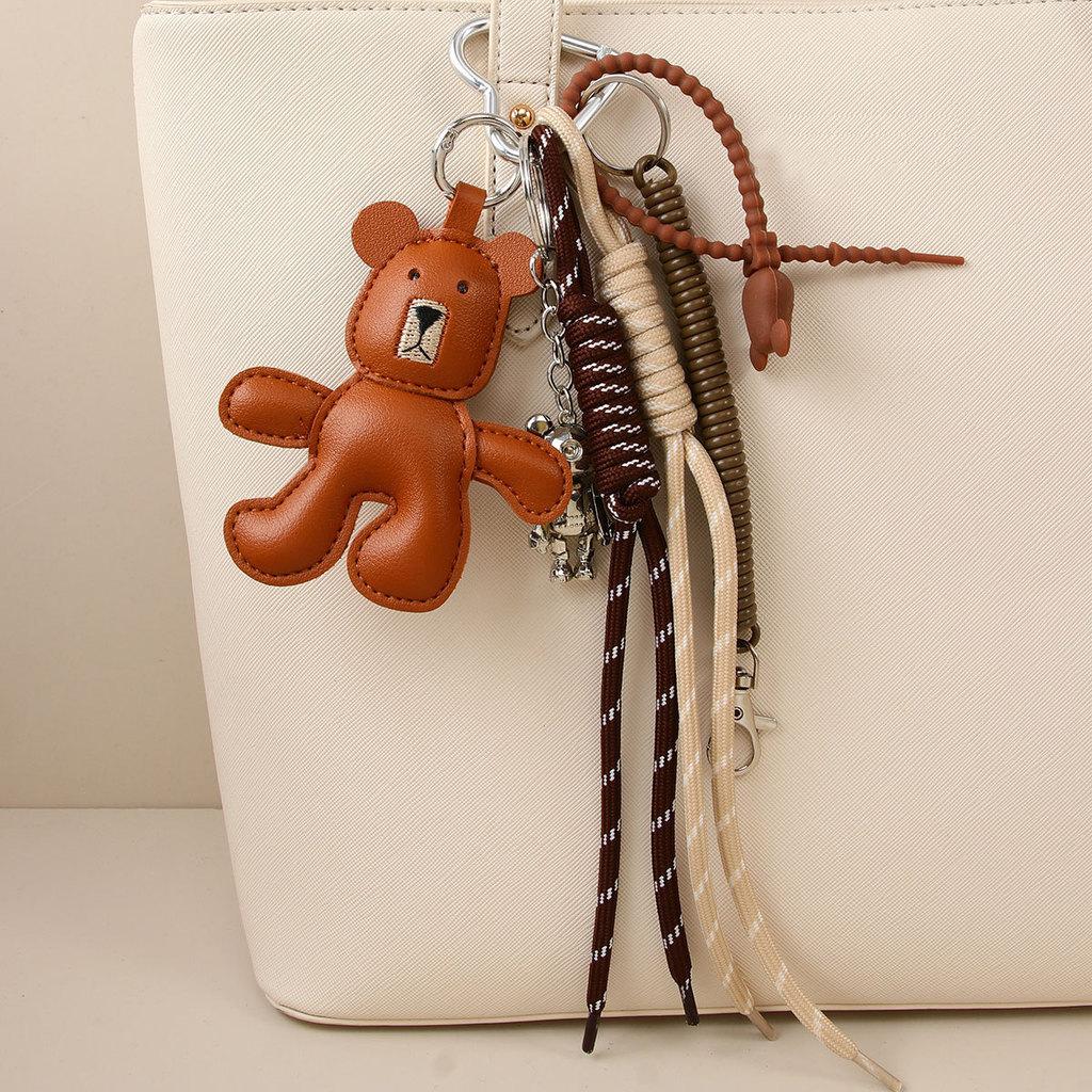 Leather Brown Bear Keychain With Articulated Limbs And Geometric Design For Fashion Accessories