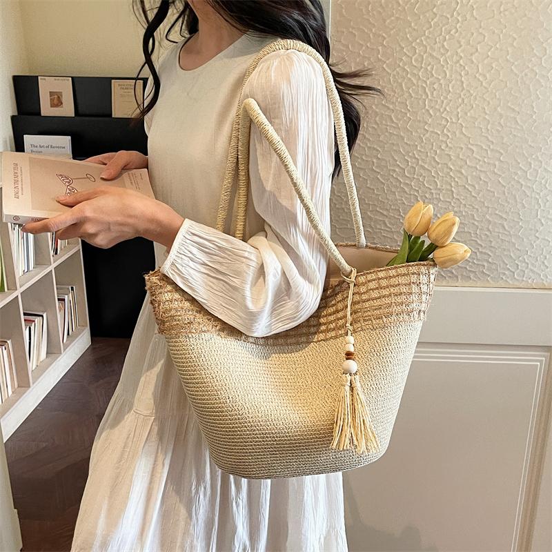 Woven Straw Tote Bag with Beaded Tassel and Open Top Design for Summer Beach or Casual Daily Use