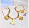Shell Starfish Conch Charms Bracelet for Women,18k Gold Plated Stainless Steel Summer Beach Waterproof Jewelry