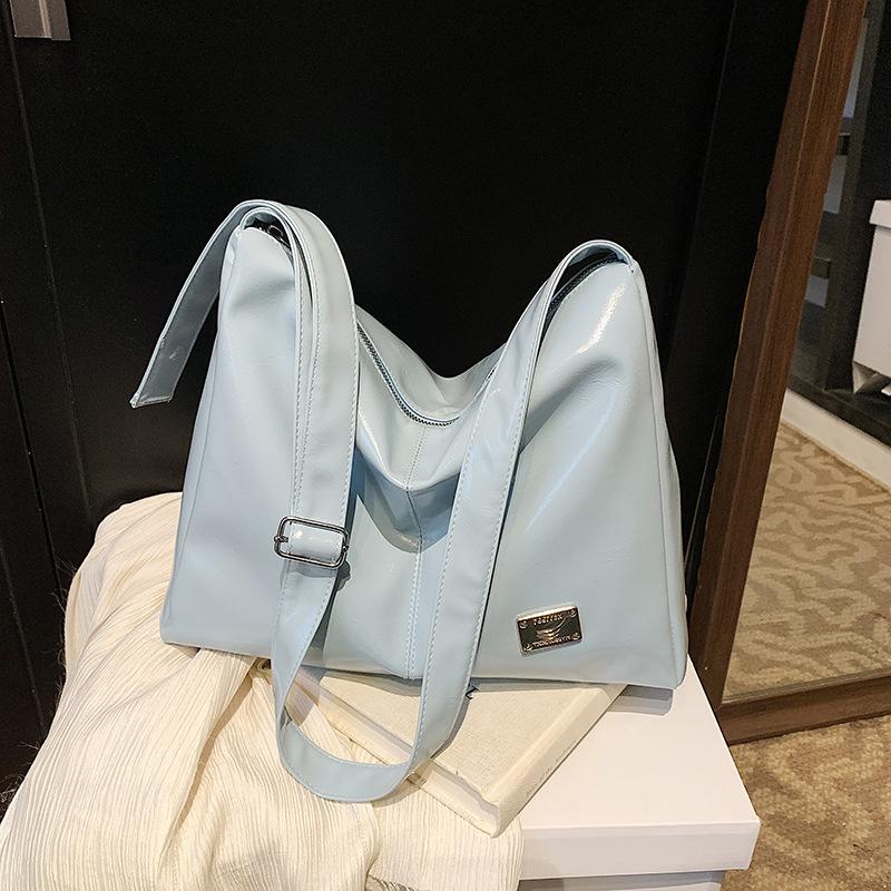 

Casual relaxation large-capacity bag women s 2025 new commuter versatile shoulder messenger bag spring and summer tote bag синий