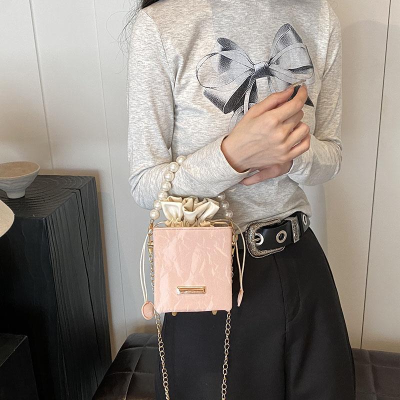 2025 spring and summer new drawstring fashion Korean version of gentle texture pearl chain handbag versatile ins messenger bag women