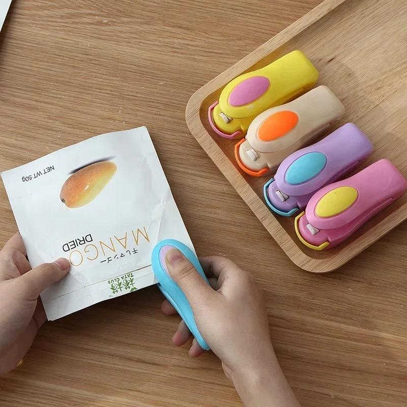 Tragbarer Snackbeutel-Verschlussclip, Haushaltswerkzeug, handgehaltener Haushalts-Kleinnahrungsmittelversiegelungsautomat, Verpackungsplastiktüten-Versiegelungsautomat