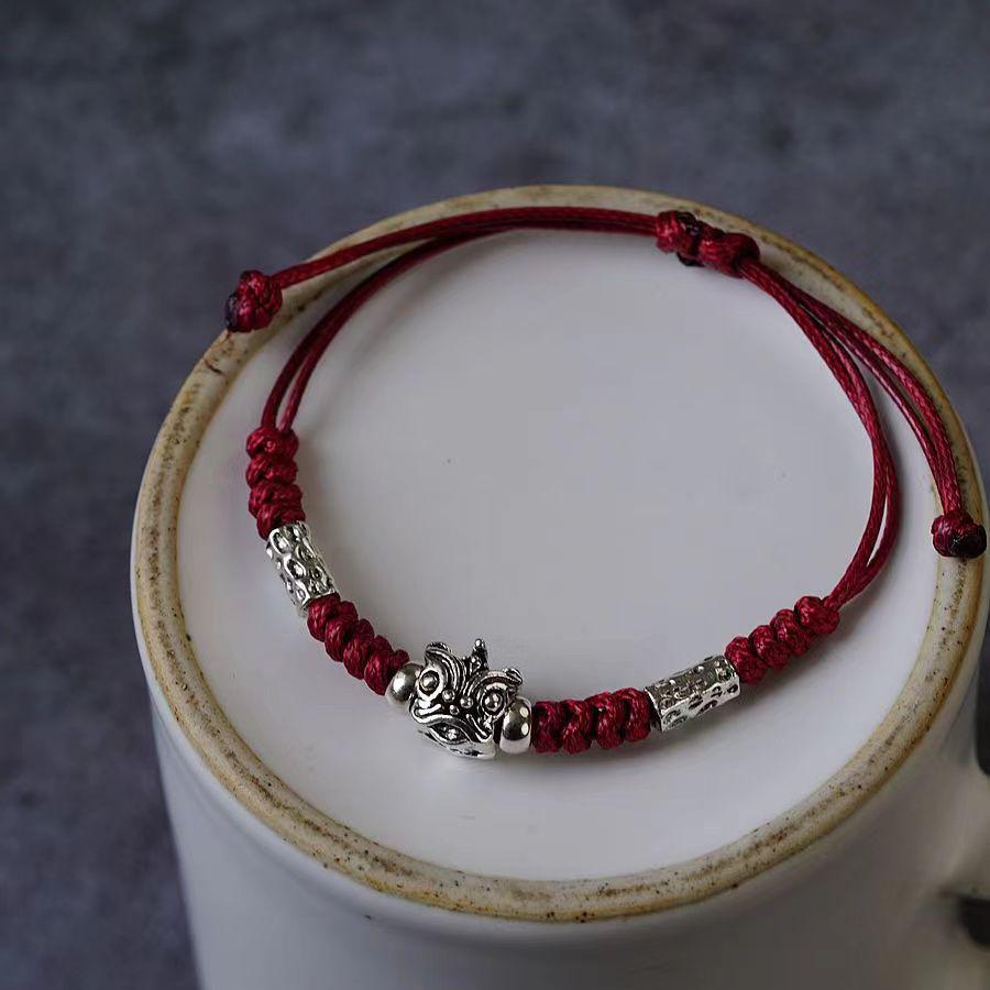 Charming Lion Dance Bracelet: Retro Unisex Adjustable Handwoven Lucky Charm.