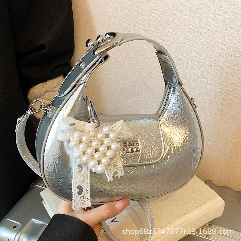 Super fire small bag women 2025 new hand carry crescent bag commuter messenger bag one shoulder armpit dumpling bag