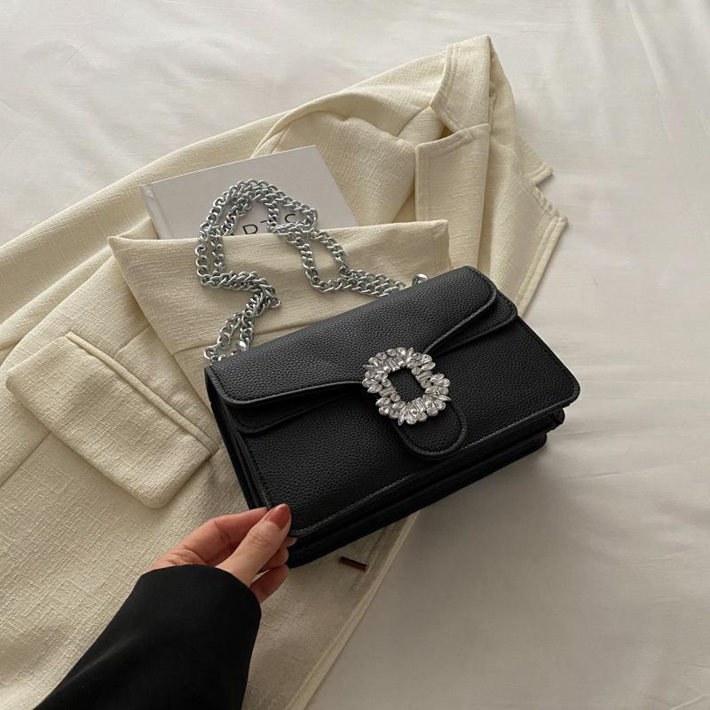 Modern Crossbody Chic Bag In Classic Colors Featuring Elegant Chain Strap And Soft Texture