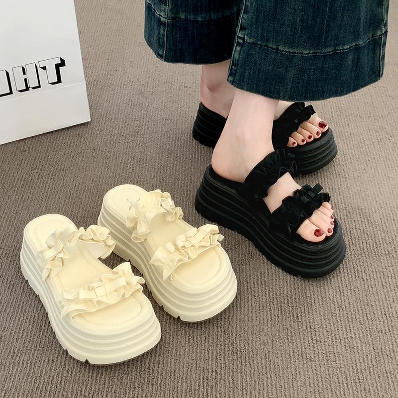Thick-soled one-word slippers women's 2025 summer new pleated lace high-end wedge heel European goods show high outer sandals