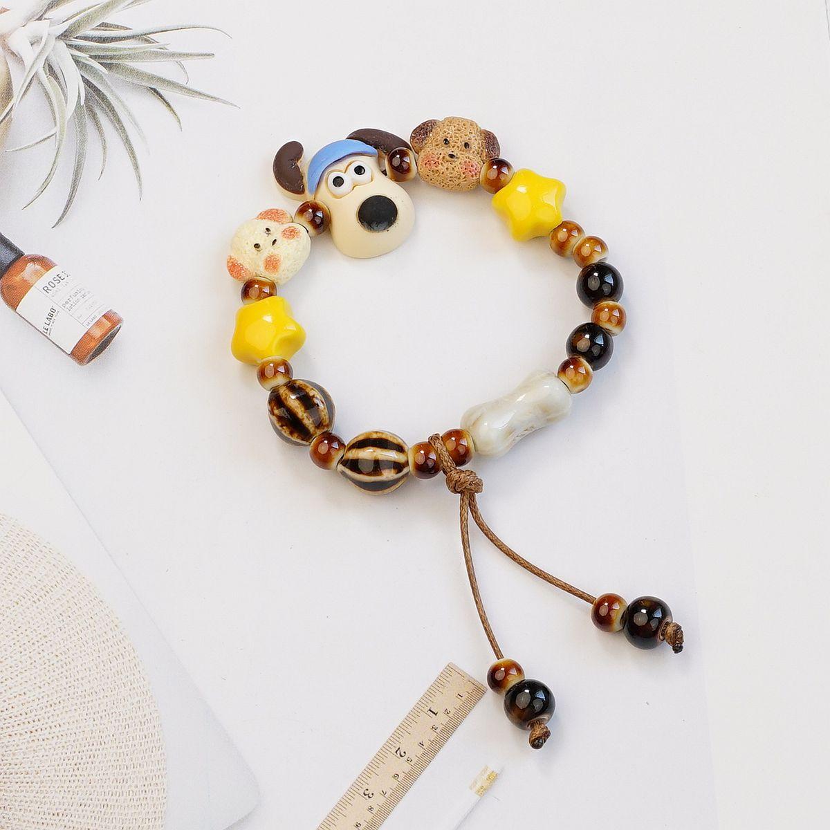 

Jingdezhen cute ceramic bracelet high value puppy good friend couple girlfriend woven hand rope does not fade