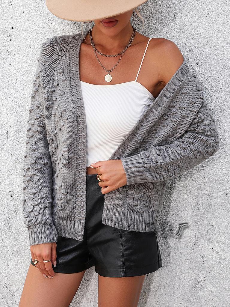 Autumn and winter new European beautiful women's knitted three-dimensional pattern cardigan jacket sweater women