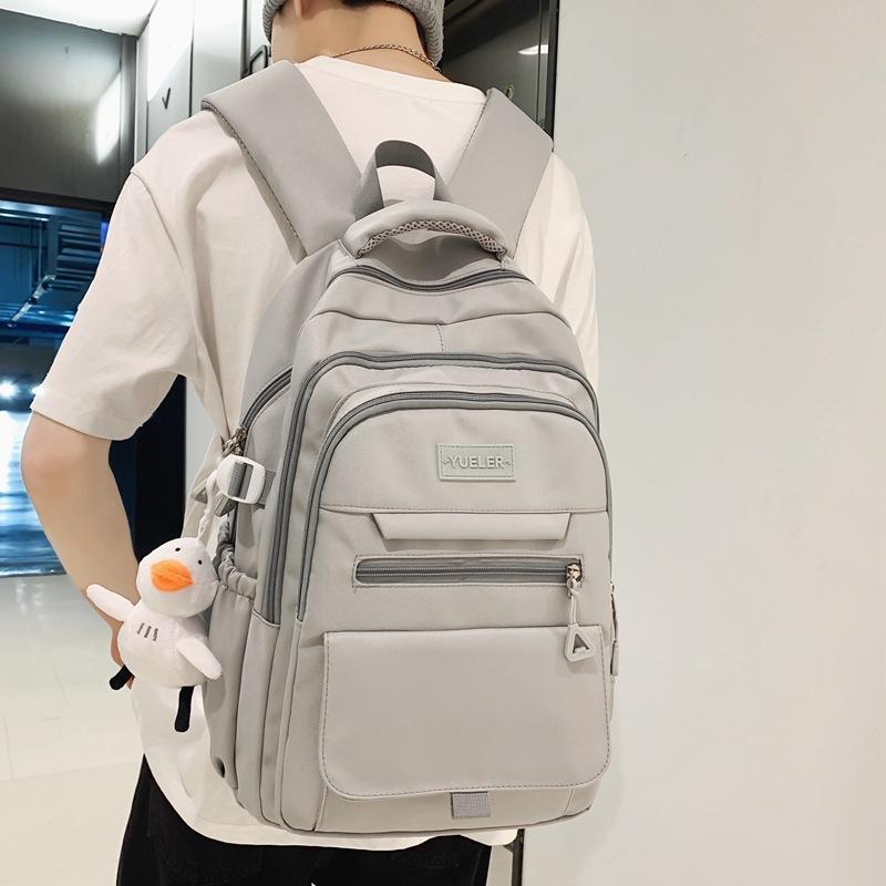 Tooling schoolbag female college students new fashion large capacity computer backpack light backpack men's travel bag tide
