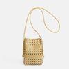 A Niche Woven Mobile Phone Bag with A Hollow Design, Featuring Fashionable and Casual Beach-style Cross-body Style. Casually