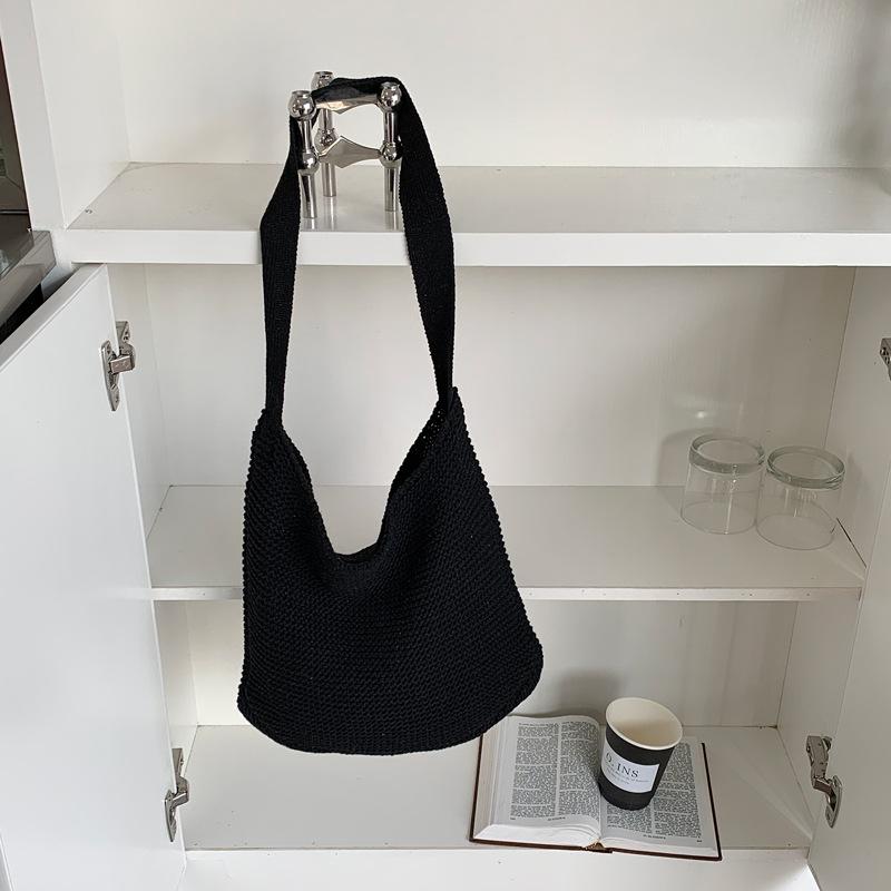 

Нова приморська вітрова сумка великої місткості жіноча універсальна повсякденна маленька свіжоткана вовняна в язана сумка чорний