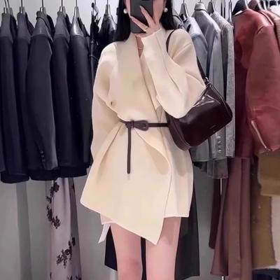 A New Women's Autumn and Winter Solid-color Mid-length Knitted Sweater Coat with A Cinched Waist and Elegant Style. It Can Be Paired with A Cardigan